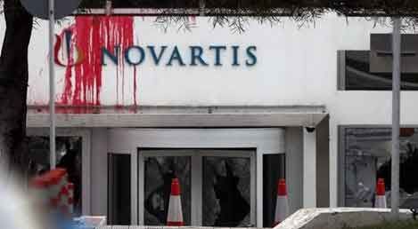 Atina'da Novartis'in binasına "kırmızı boyalı" saldırı